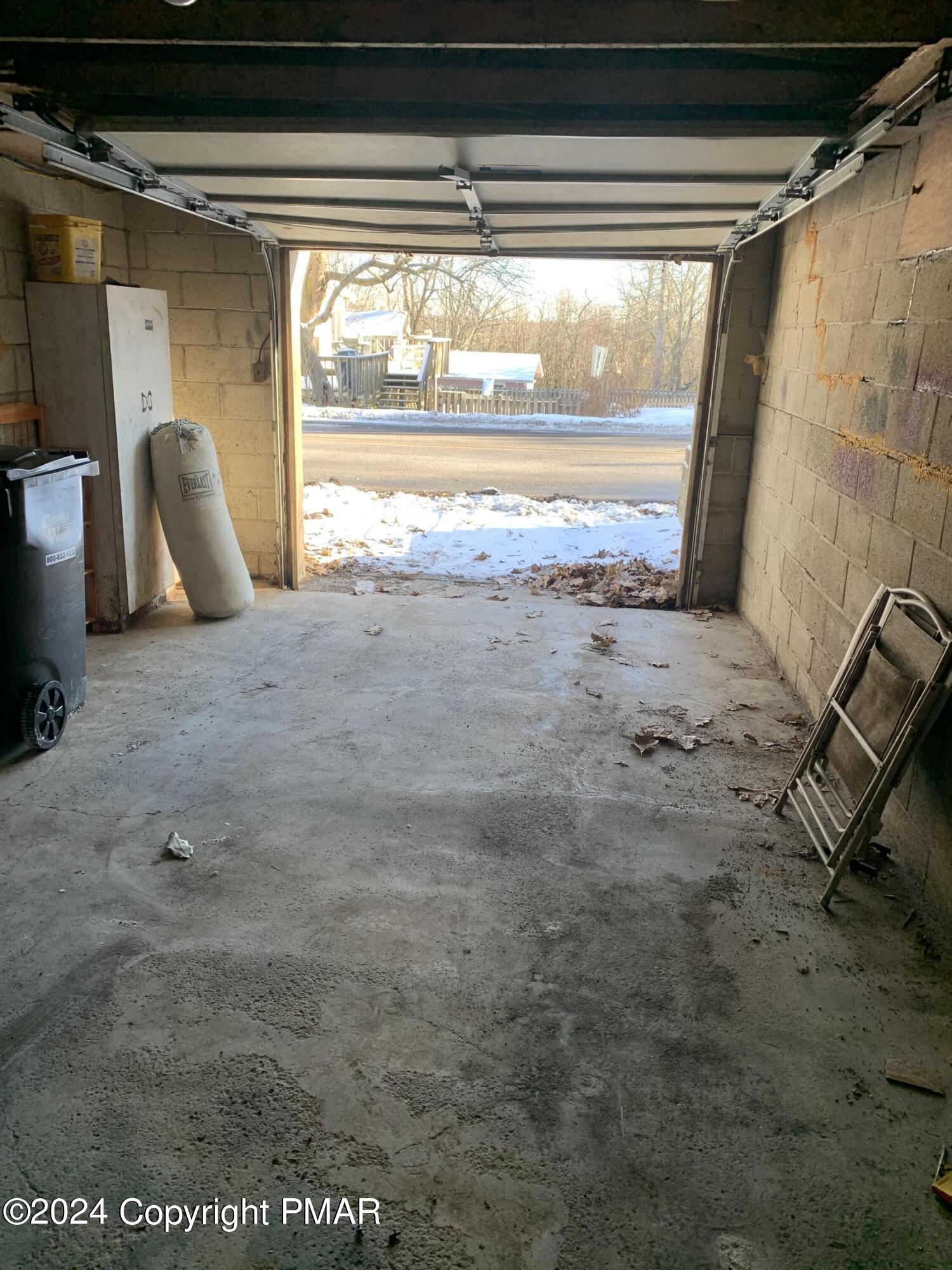 28 Reeder Street Mount Pocono, PA 18344 - Photo 17 of 17 a view of a closet with wooden floor and door