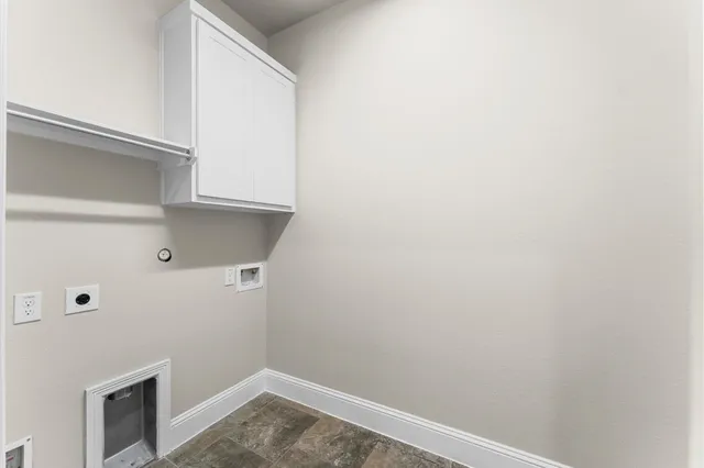 a large bathroom with a large tub and sink