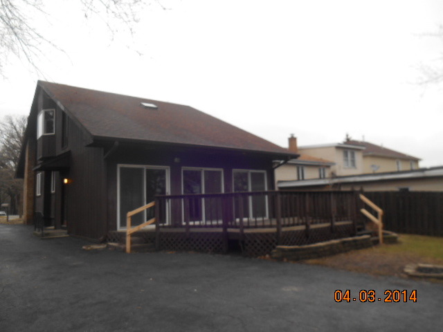 1511 Burr Oak Road Homewood, IL 60430 - Photo 3 of 10 a view of a house with a garage
