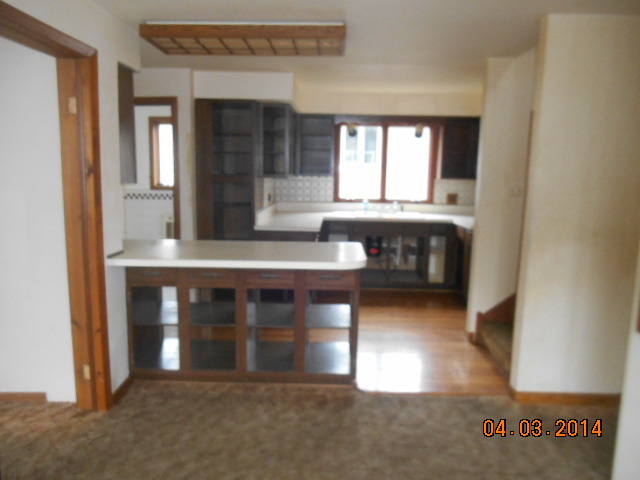 1511 Burr Oak Road Homewood, IL 60430 - Photo 5 of 10 a hallway with a table and window