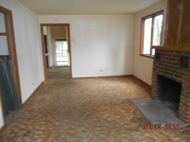 1511 Burr Oak Road Homewood, IL 60430 - Photo 6 of 10 an empty room with windows