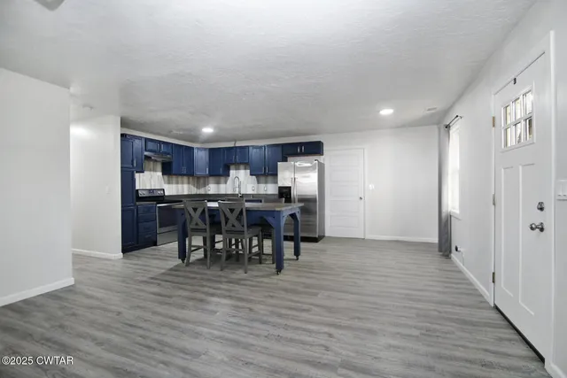 a view of kitchen and dining room