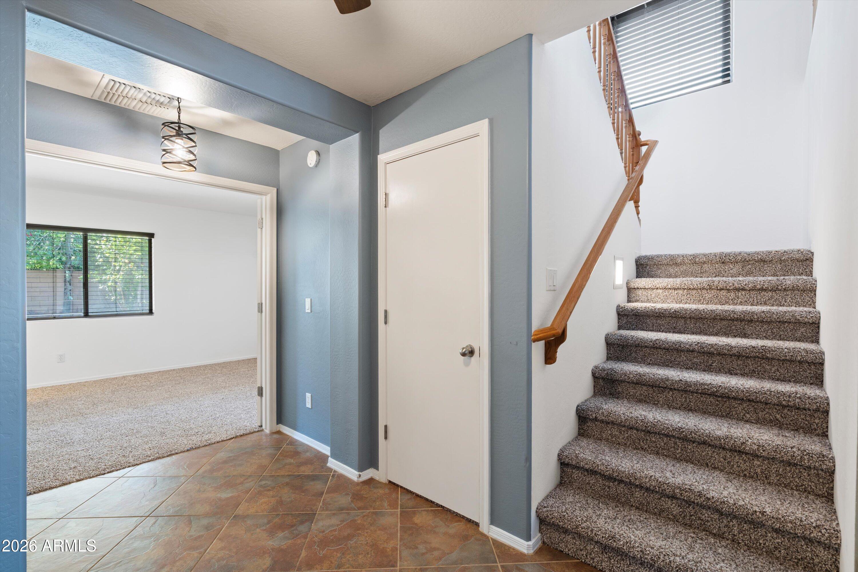 1231 West Ocotillo Street Coolidge, AZ 85128 - Photo 23 of 57 a view of an entryway with staircase