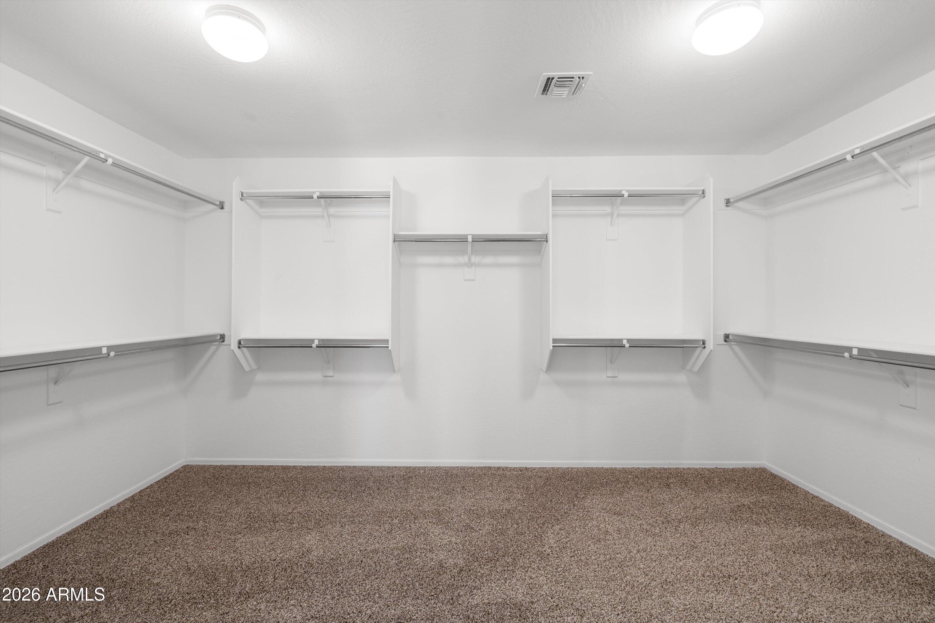 1231 West Ocotillo Street Coolidge, AZ 85128 - Photo 32 of 57 a view of an empty walk in closet