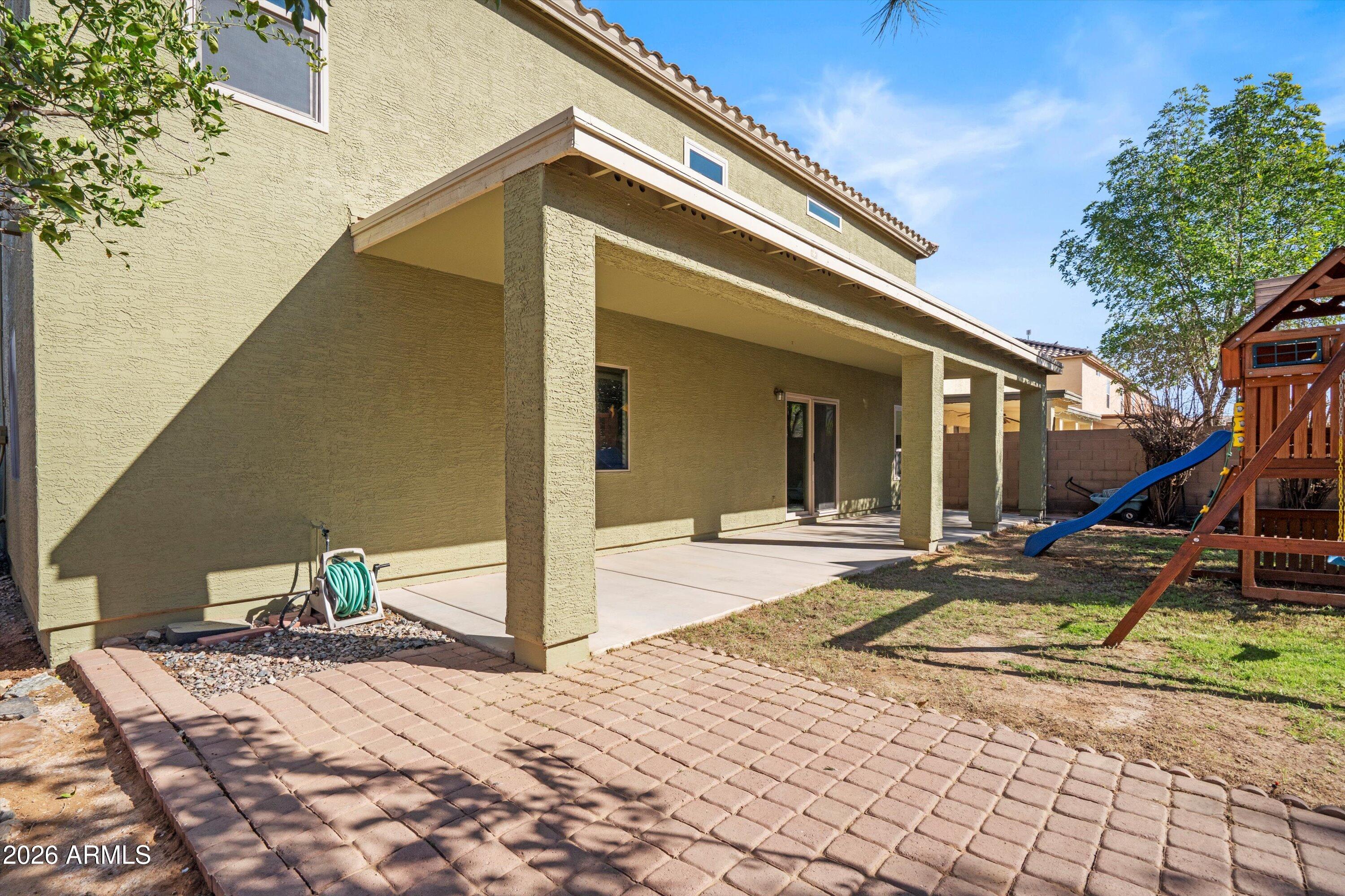 1231 West Ocotillo Street Coolidge, AZ 85128 - Photo 42 of 57 a view of a house with backyard and trees