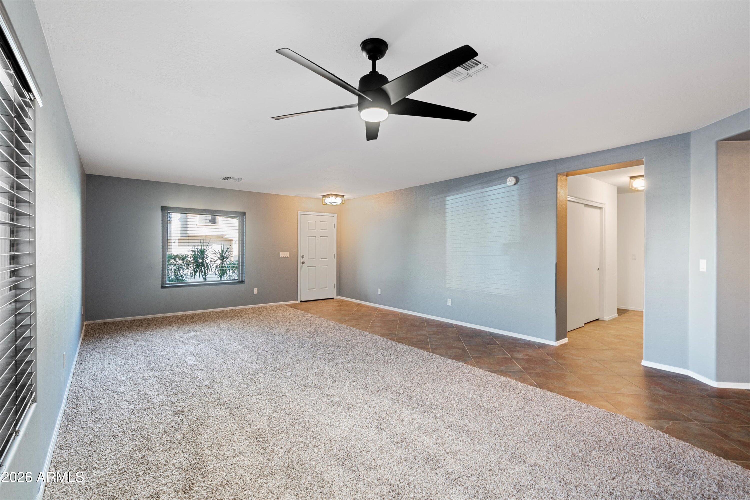 1231 West Ocotillo Street Coolidge, AZ 85128 - Photo 7 of 57 a view of empty room with windows