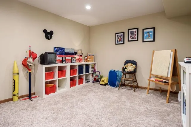 a view of a workspace with furniture