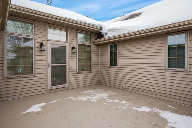 a view of a house with a large window