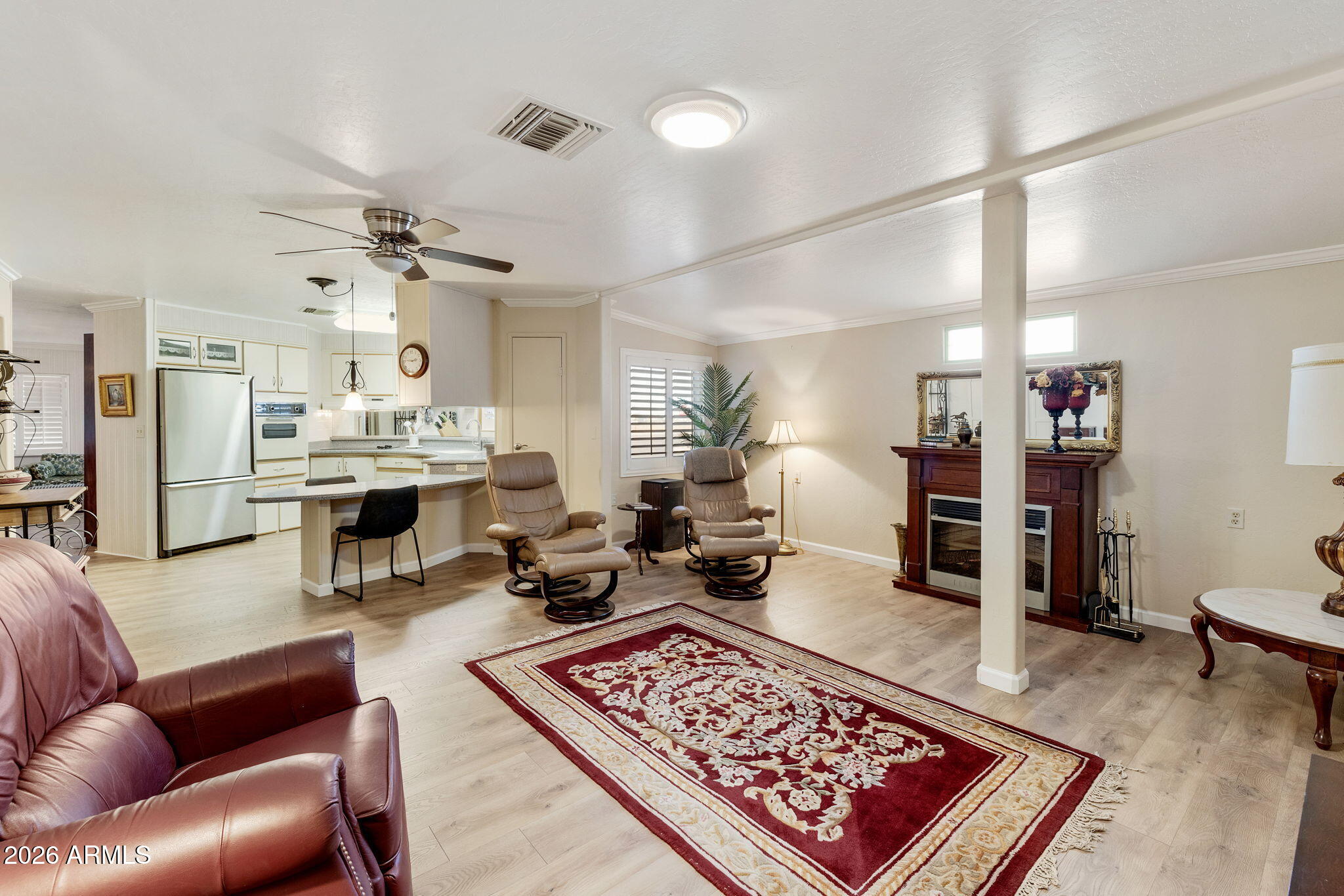 2435 North Higley Road Mesa, AZ 85215 - Photo 43 of 84 a living room with furniture and a rug
