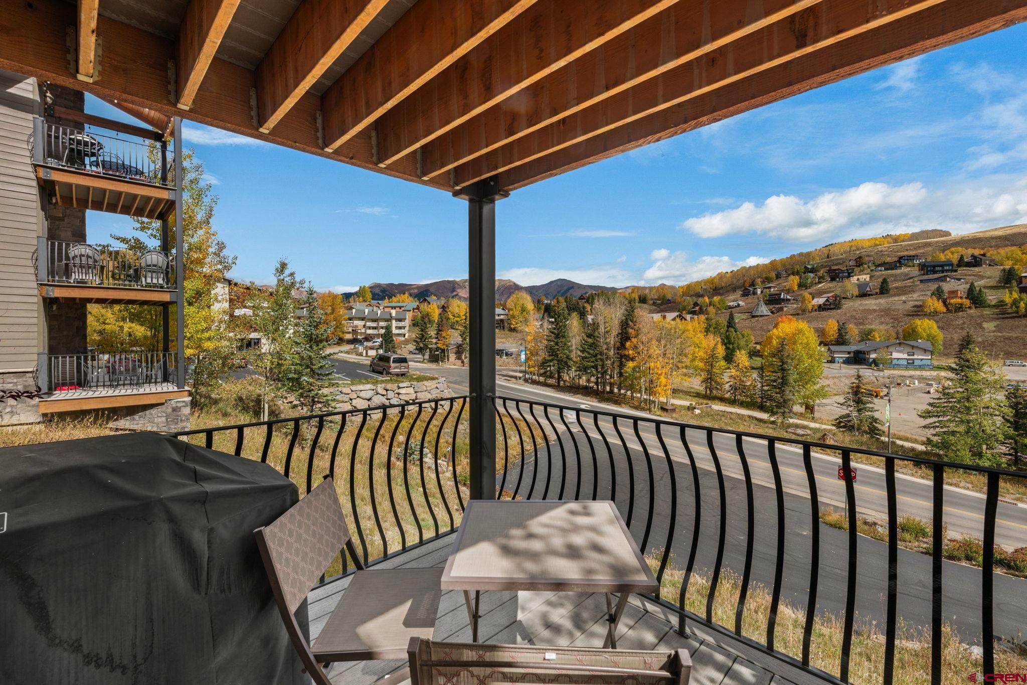 651 Gothic Road, Unit 502 Crested Butte, CO 81225 - Photo 14 of 44 a view of a balcony with furniture
