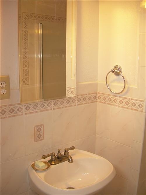 648 Parkview Circle Pacifica, CA 94044 - Photo 4 of 4 a bathroom with a sink and a mirror