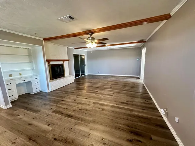 a view of a livingroom with a fireplace