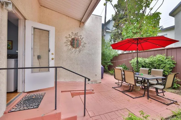 an outdoor view of a house with garden