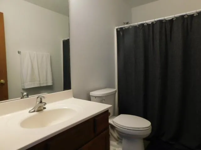 a view of a room with a wooden walls