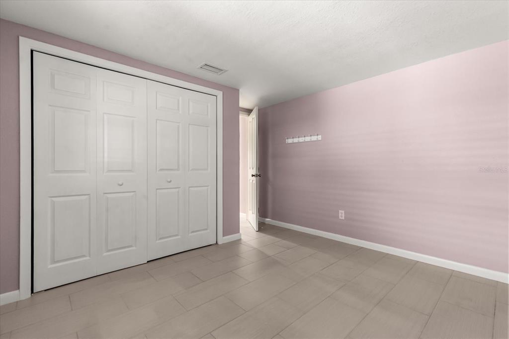 620 Jacaranda Street Dunedin, FL 34698 - Photo 15 of 30 an empty room with closet area