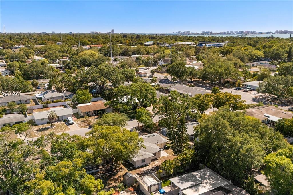 620 Jacaranda Street Dunedin, FL 34698 - Photo 26 of 30 an aerial view of residential houses with outdoor space and trees