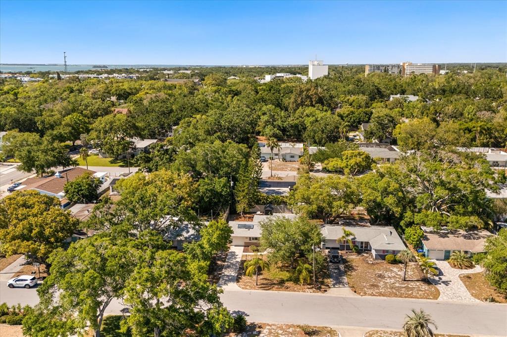 620 Jacaranda Street Dunedin, FL 34698 - Photo 28 of 30 an aerial view of residential houses with outdoor space and trees