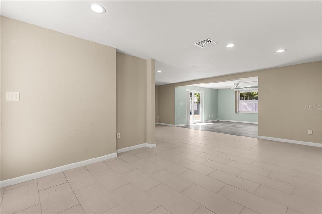 620 Jacaranda Street Dunedin, FL 34698 - Photo 3 of 30 an empty room with entrance and door