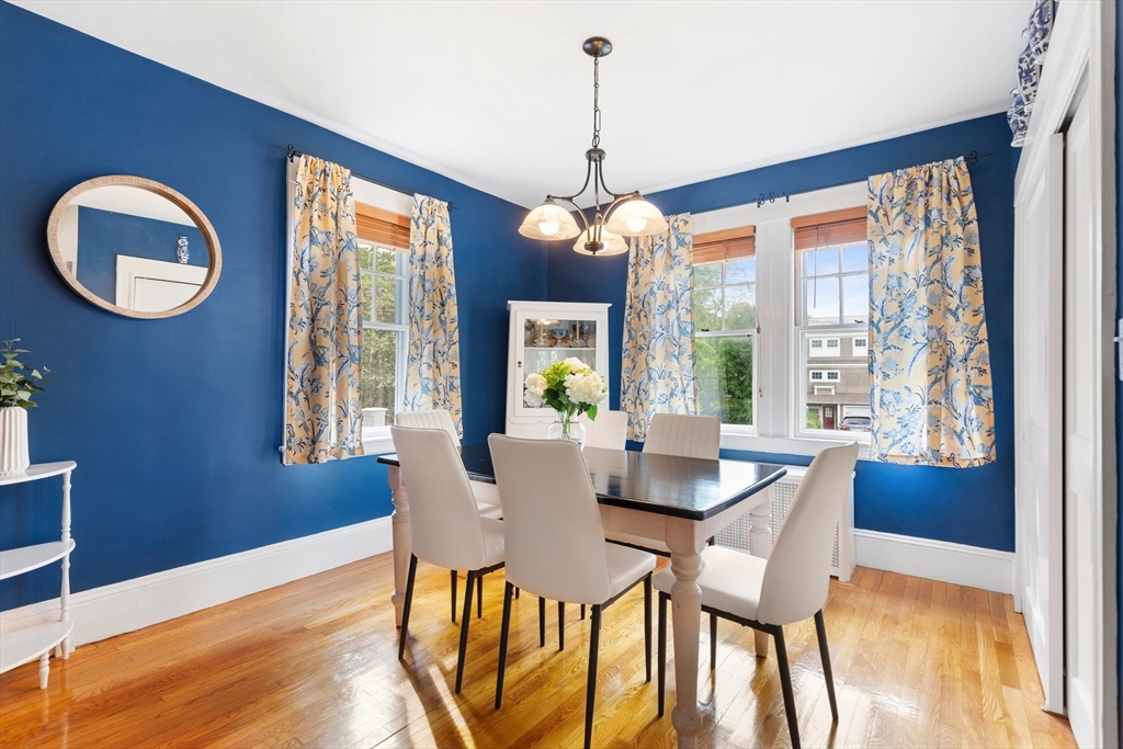 500 Lowell Street Lexington, MA 02420 - Photo 5 of 25 a view of a dining room with furniture wooden floor and chandelier