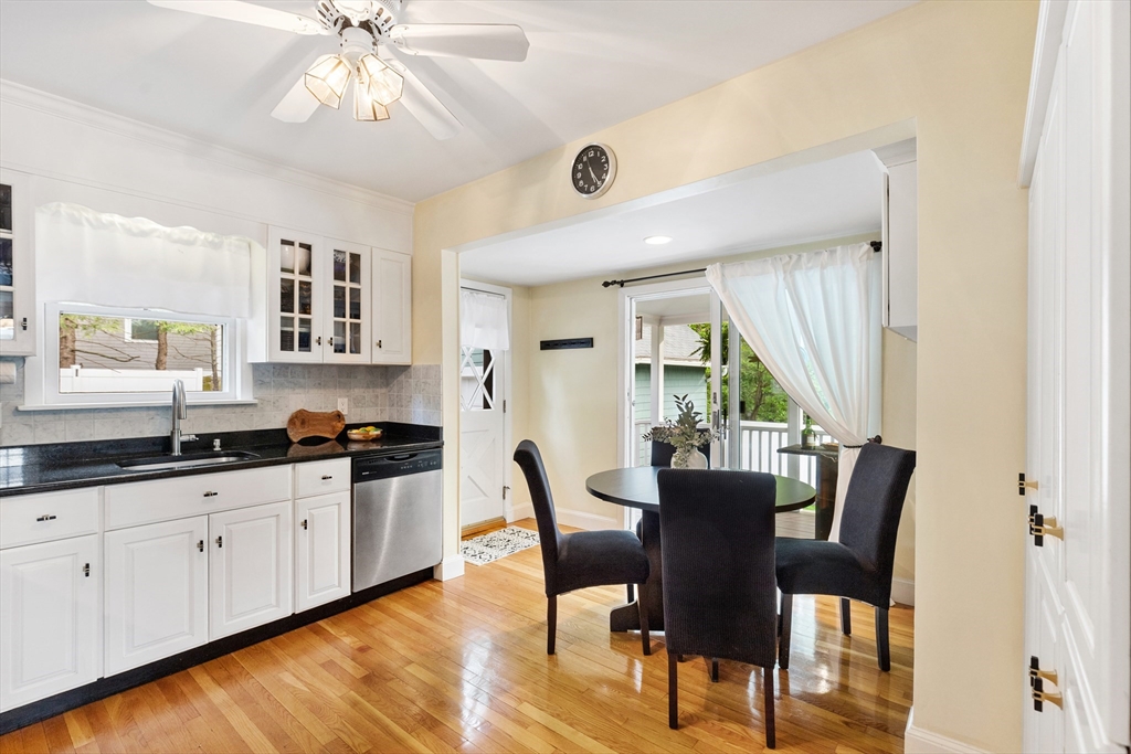 500 Lowell Street Lexington, MA 02420 - Photo 7 of 25 a view of a dining room with furniture window and wooden floor