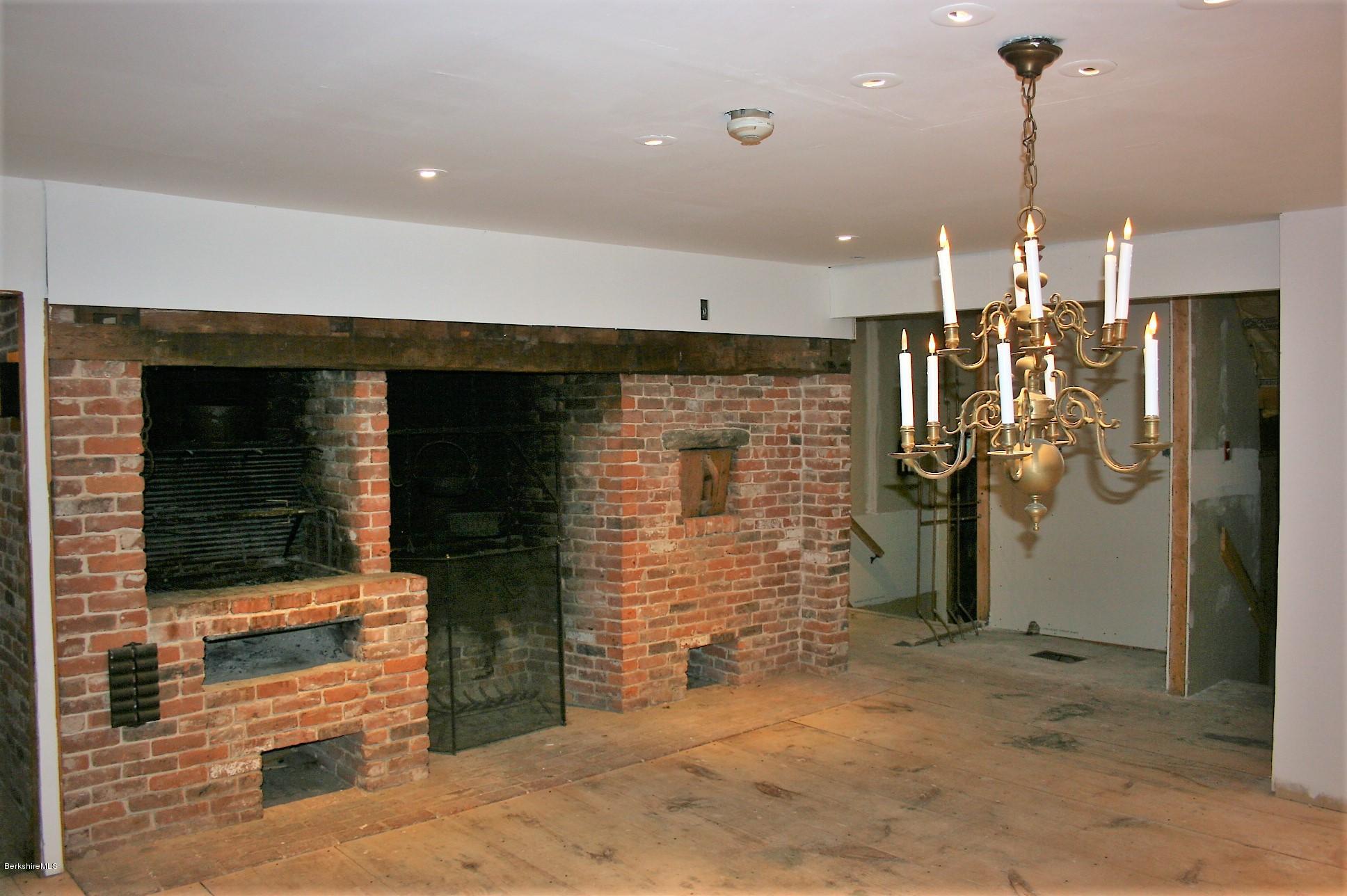 117 East River Road Middlefield, MA 01050 - Photo 13 of 20 a room with water heater and a refrigerator