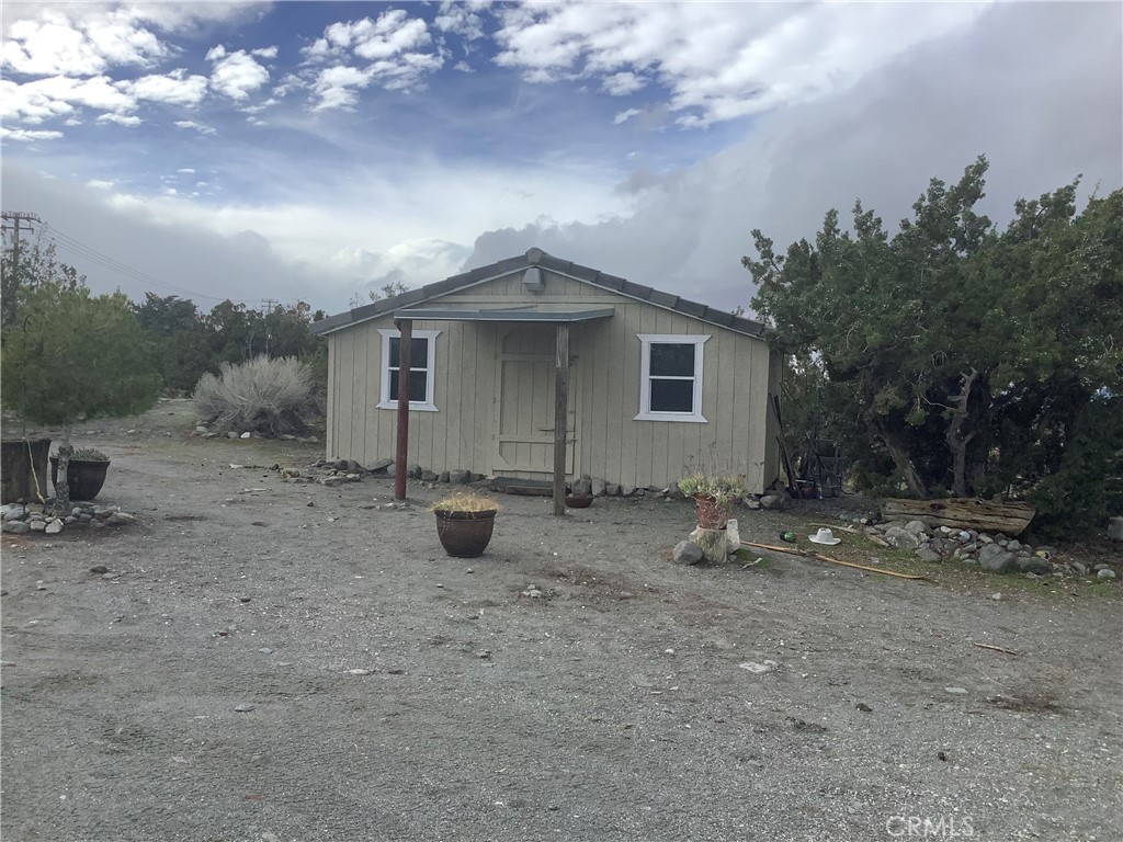 2830 Phelan Road Phelan, CA 92371 - Photo 5 of 10 a view of a house with a backyard