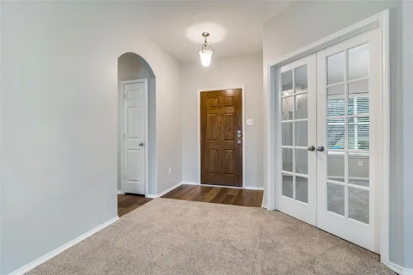 an empty room with windows