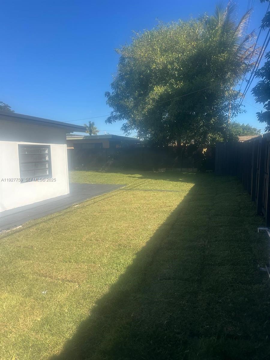 6750 Allen Street Hollywood, FL 33024 - Photo 15 of 79 a view of an ocean yard and mountain view