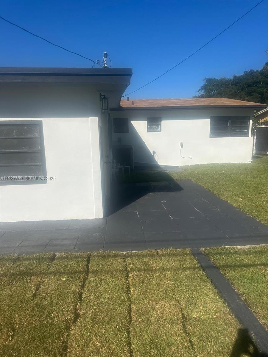 6750 Allen Street Hollywood, FL 33024 - Photo 17 of 79 a view of a back yard of the house