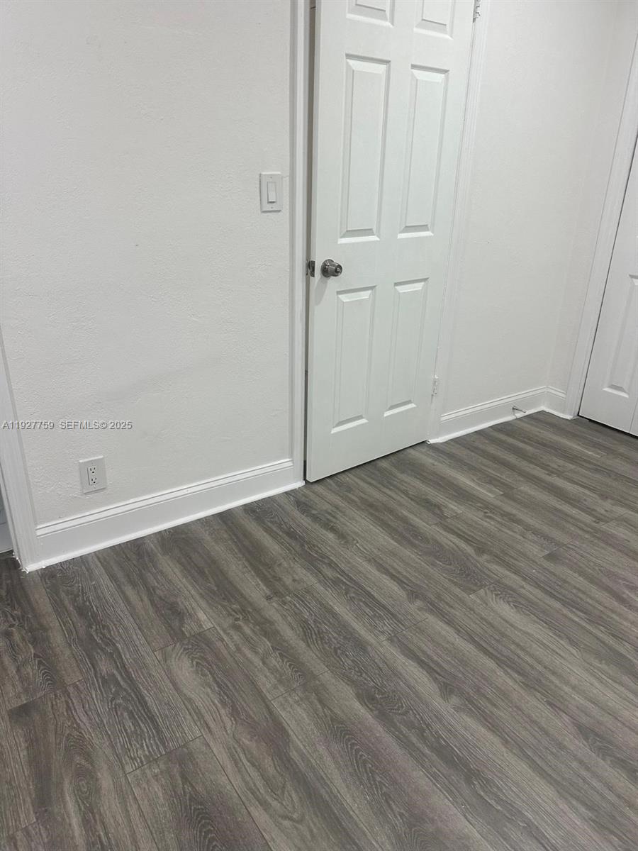6750 Allen Street Hollywood, FL 33024 - Photo 33 of 79 a view of a room with wooden floor
