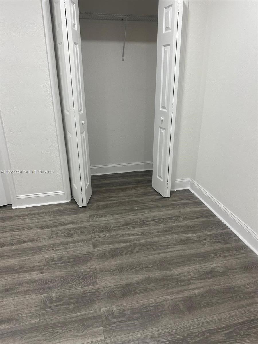 6750 Allen Street Hollywood, FL 33024 - Photo 35 of 79 a view of a room with wooden floor