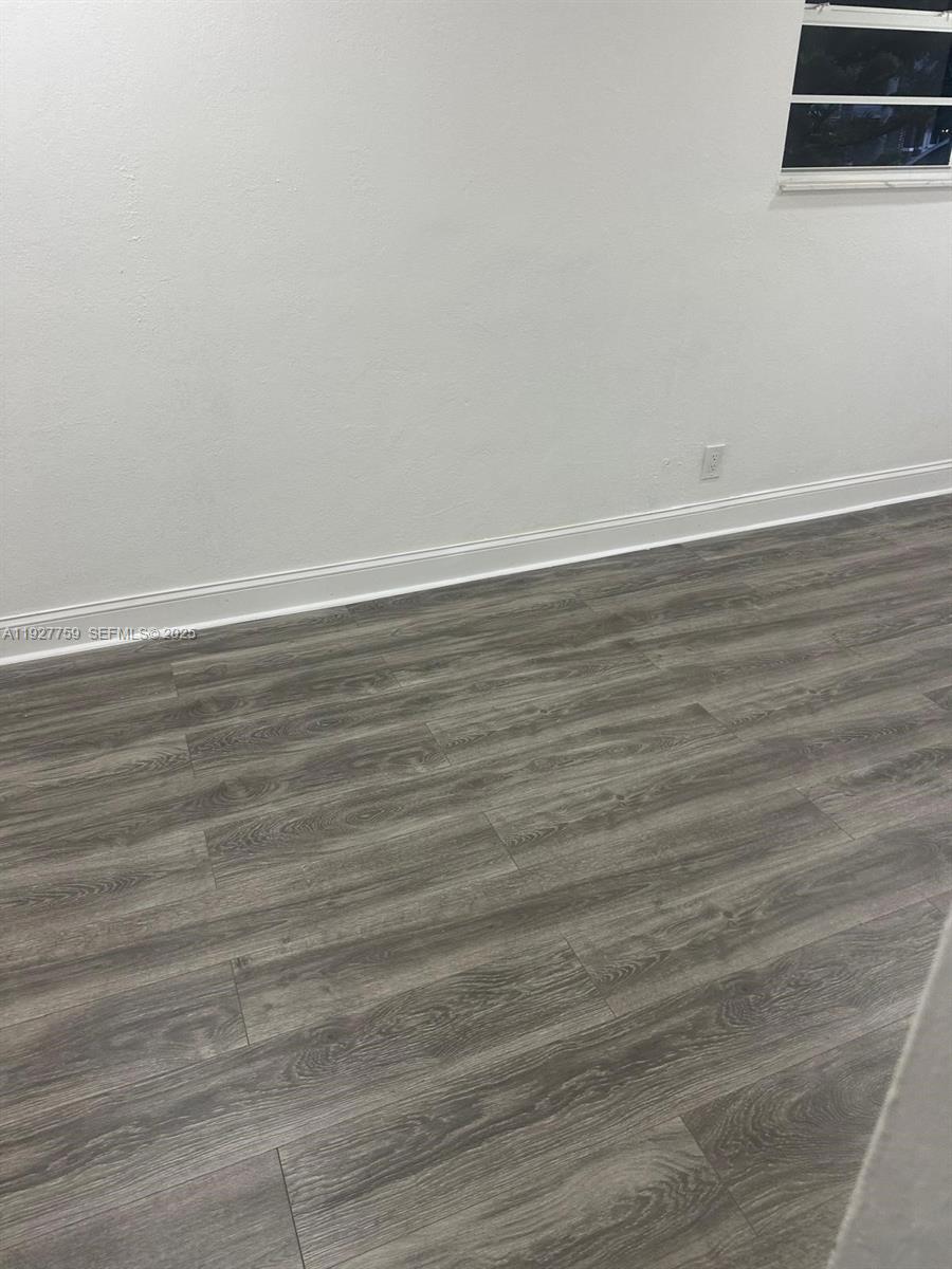 6750 Allen Street Hollywood, FL 33024 - Photo 39 of 79 a view of a room with wooden floor