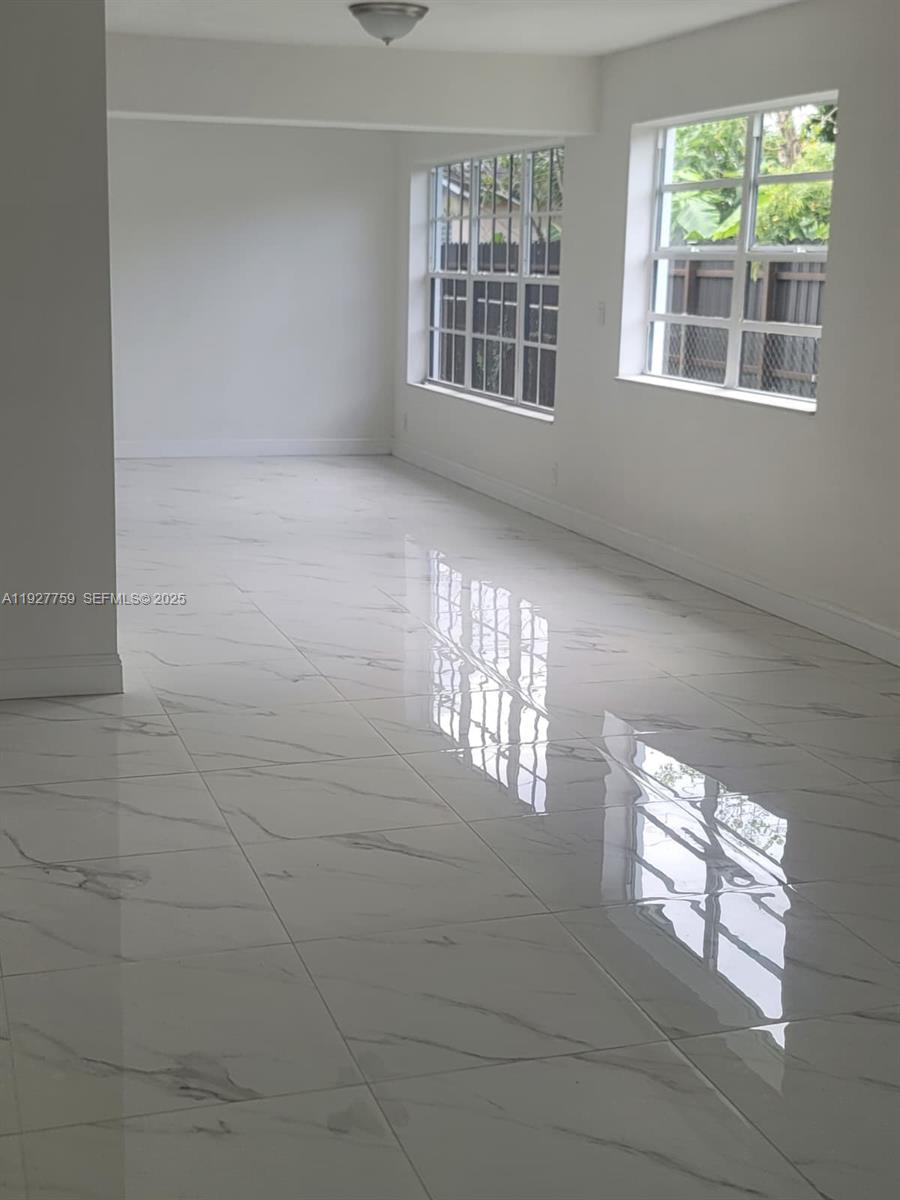6750 Allen Street Hollywood, FL 33024 - Photo 49 of 79 a view of an empty room with windows