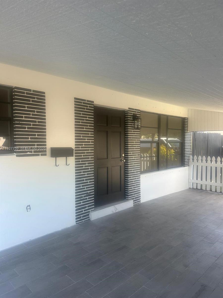 6750 Allen Street Hollywood, FL 33024 - Photo 5 of 79 a view of an empty room with a bathroom