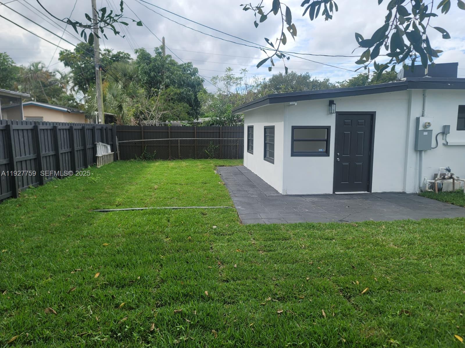 6750 Allen Street Hollywood, FL 33024 - Photo 78 of 79 a front view of a house with garden