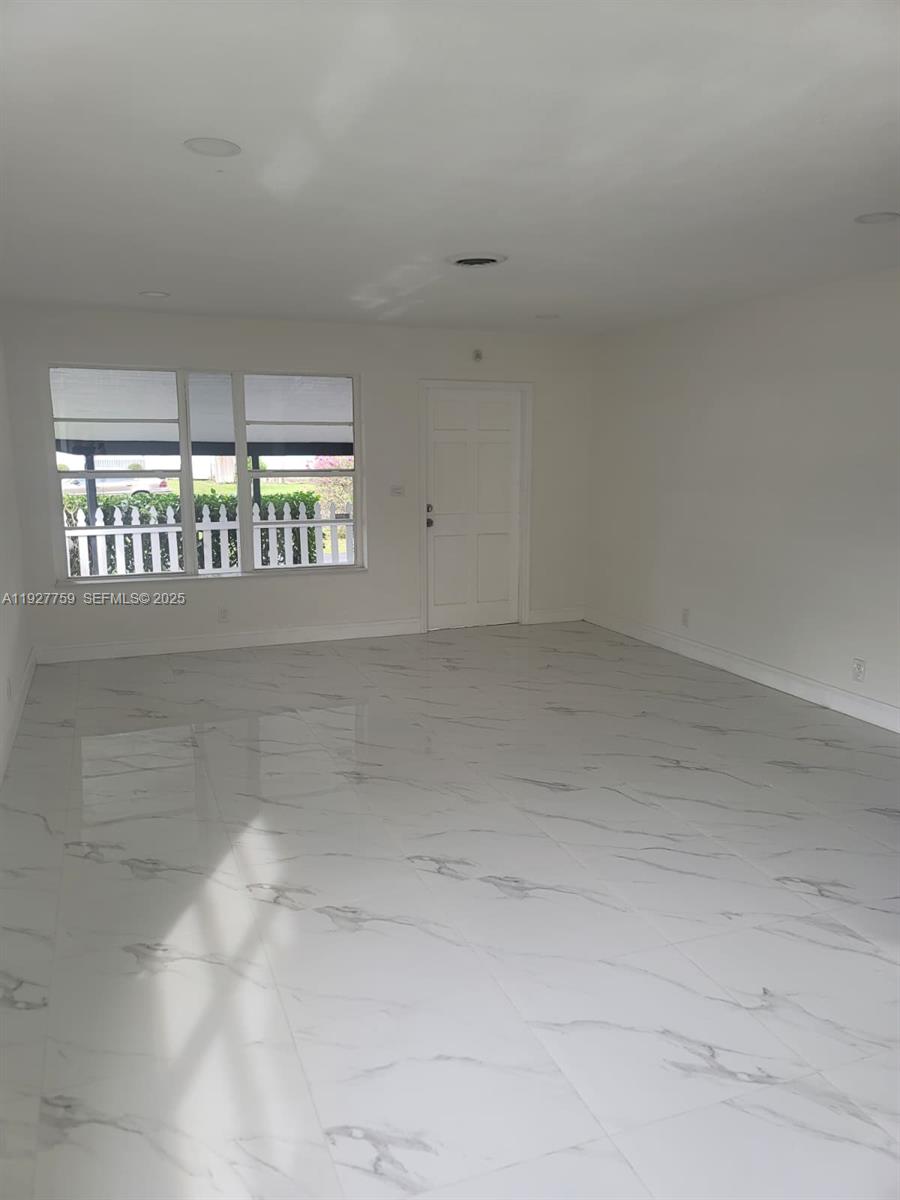6750 Allen Street Hollywood, FL 33024 - Photo 79 of 79 a view of an empty room and window