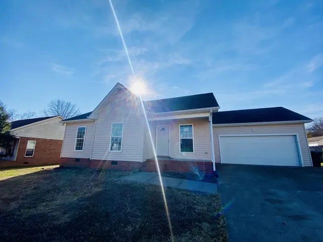 a house view with a backyard space