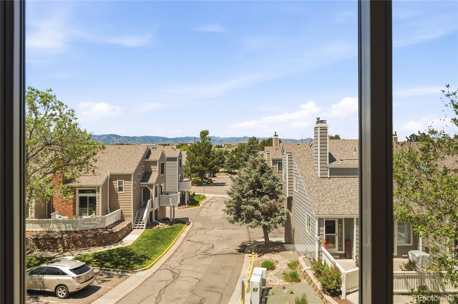 155 Blue Spruce Court Highlands Ranch, CO 80126 - Photo 22 of 29 a view of a city with tall buildings