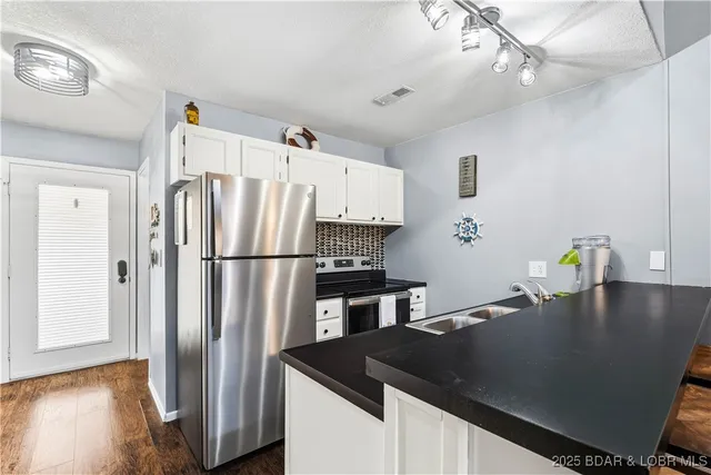 $215,000 | 875 Parkside Place, Unit 402D, Osage Beach, MO 65065