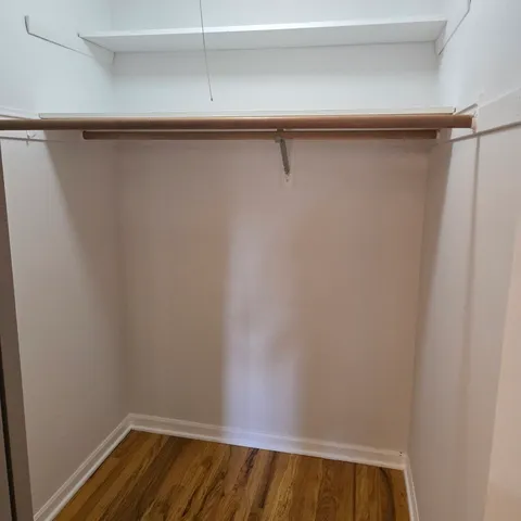 a view of a room with racks on the wall