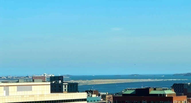 8 Whittier Place, Unit 21E Boston, MA 02114 - Photo 22 of 34 a view of city and ocean