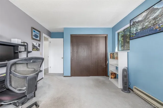 a view of an empty room with shelves