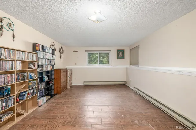 a view of a big room with lots of shelves