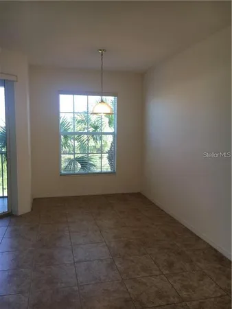 an empty room that has a window