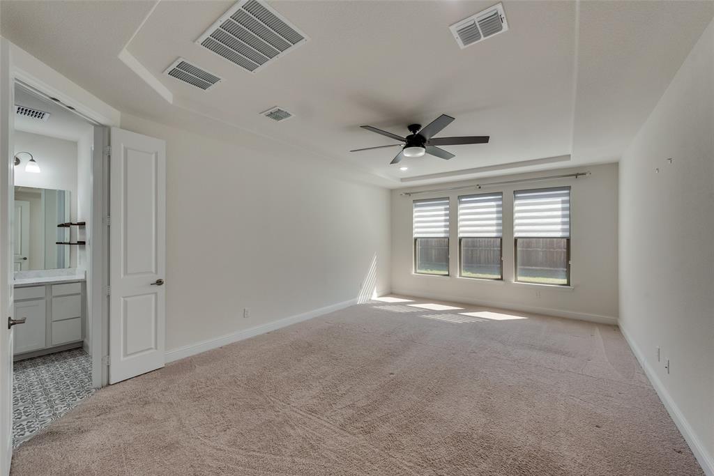 16476 Ryder Rock Road Frisco, TX 75033 - Photo 24 of 40 Large Master bedroom w/ high tray ceilings