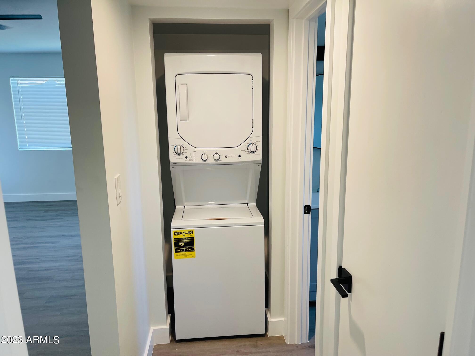 6233 North 13th Place, Unit 1 Phoenix, AZ 85014 - Photo 15 of 20 a utility room with dryer and washer