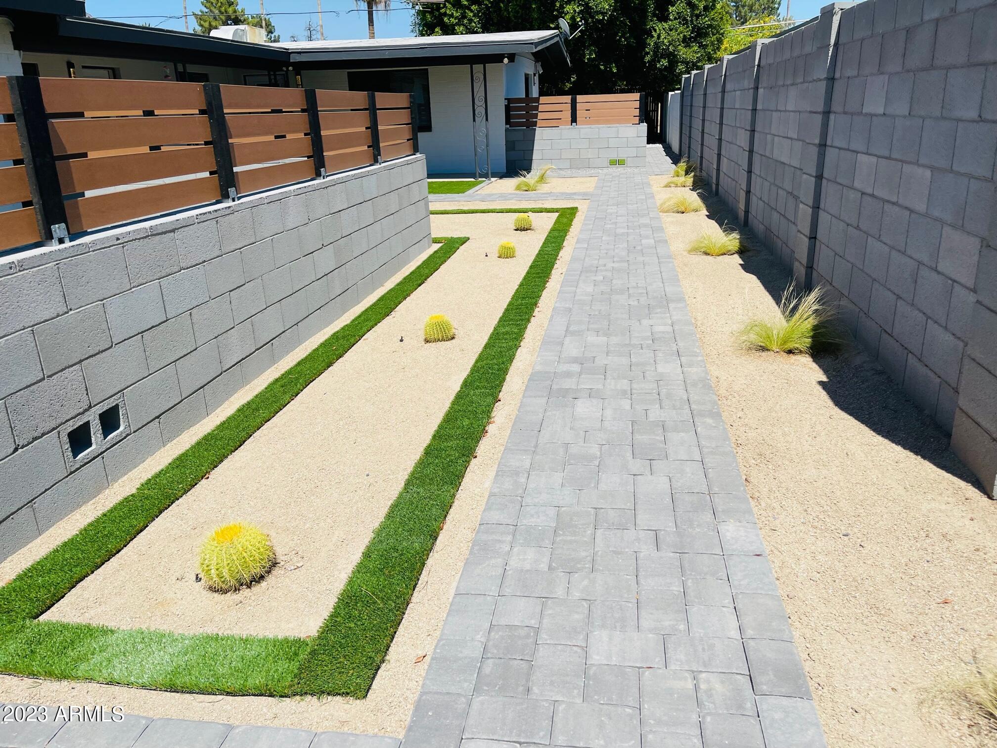 6233 North 13th Place, Unit 1 Phoenix, AZ 85014 - Photo 5 of 20 a view of swimming pool with sitting area