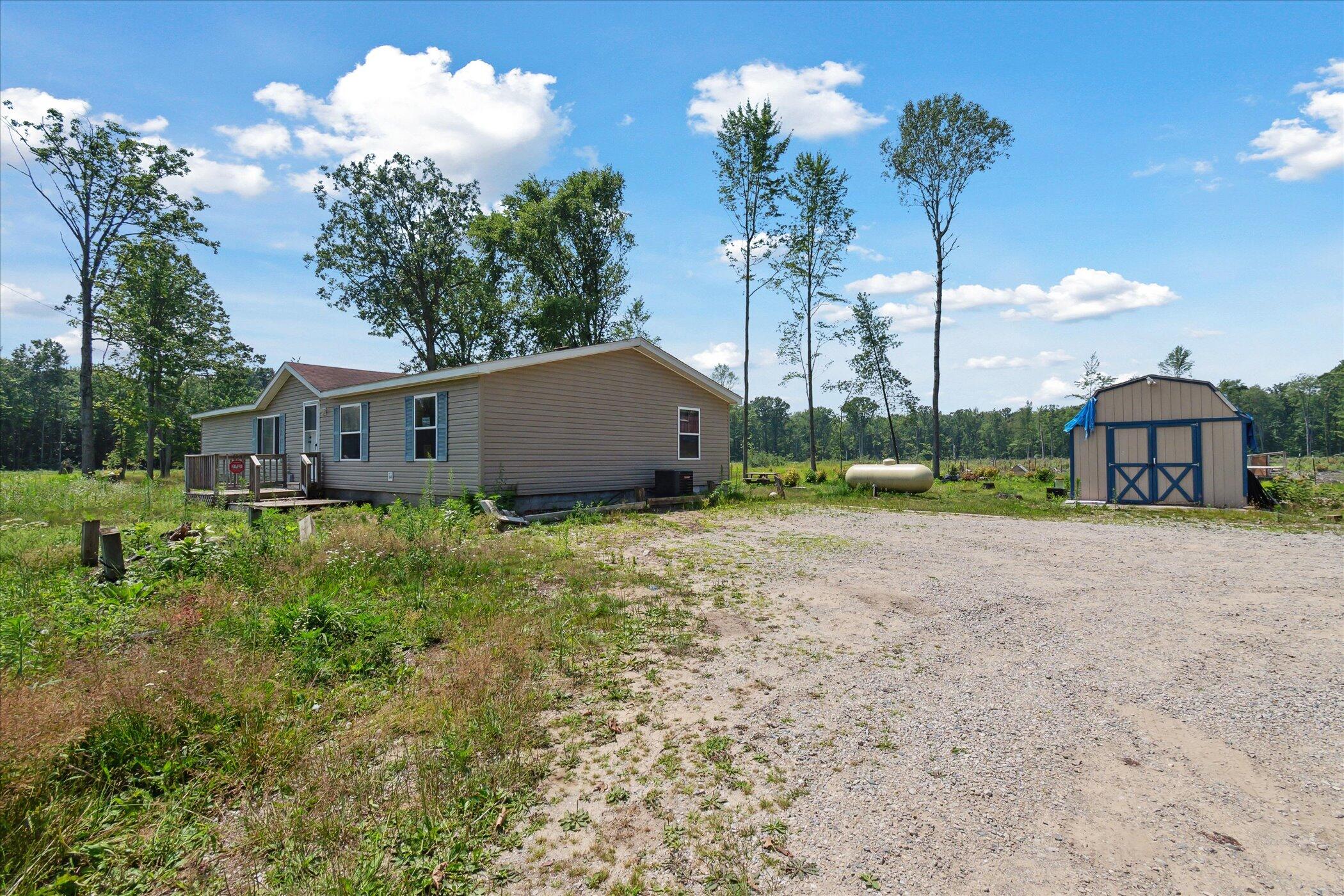 939 North Coleman Road Shepherd, MI 48883 - Photo 4 of 38 04-939-N-Coleman-Rd-Shepherd-MI-48883-Wi