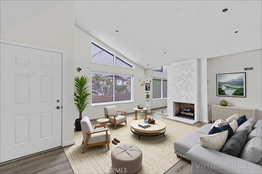 5161 Rotherham Circle Westminster, CA 92683 - Photo 1 of 24 a living room with furniture and a fireplace