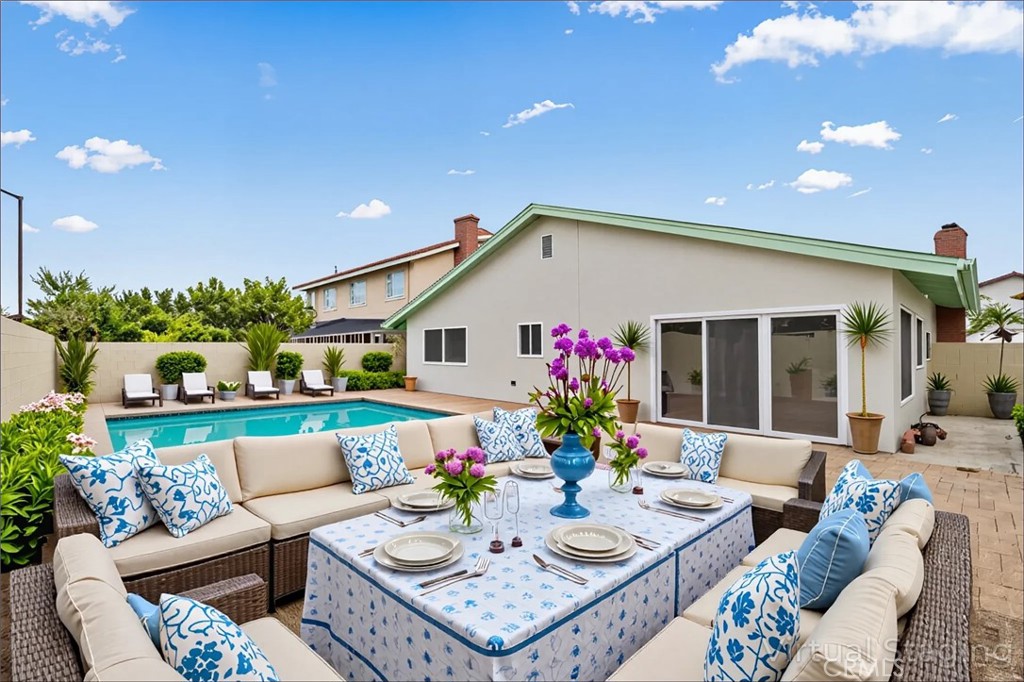 5161 Rotherham Circle Westminster, CA 92683 - Photo 18 of 24 a view of a patio with couches and potted plants